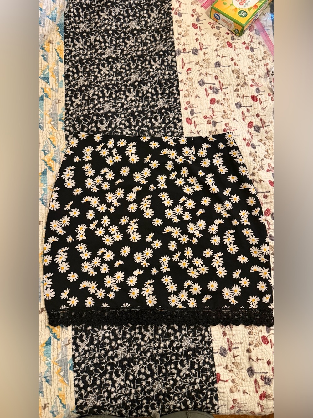 Black Daisy Print Mini Skirt with Lace Trim